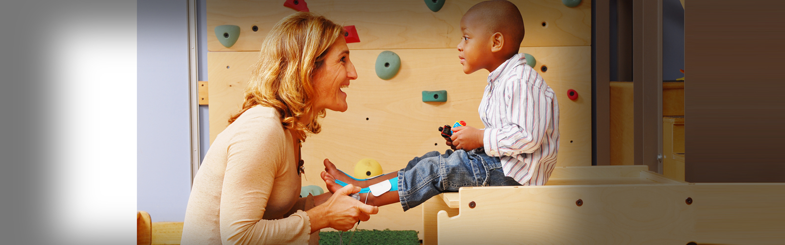 A child receiving PACT specialized care from a doctor.