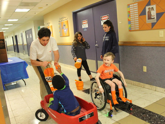 The family members of WIN members interact with patients during an Inpatient Family Dinner