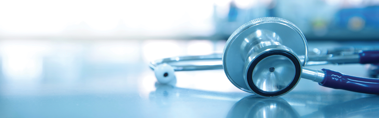 A stethoscope for sits on medical laboratory table. 