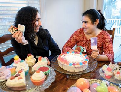 Andrea and a friend play a game