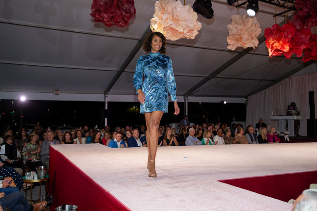 A woman walks the runway at Fall Fête 5.