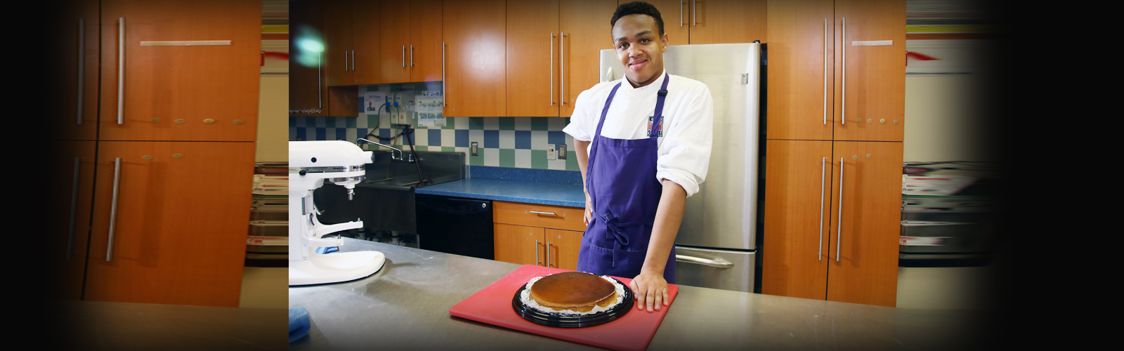 Jeremiah standing in his kitchen with a fresh pie