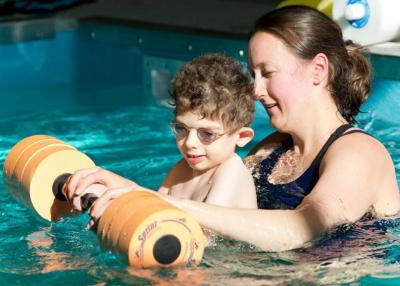 patient and therapist in the therapy pool