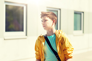boy in yellow jacket