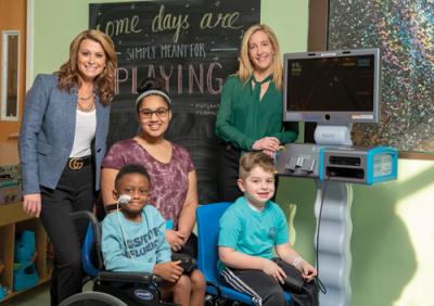 Lisa Vogel, Aimee Fulchino and patients with the Starlight Fun Center