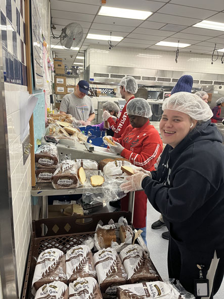 CORE careers participants work in a kitchen.