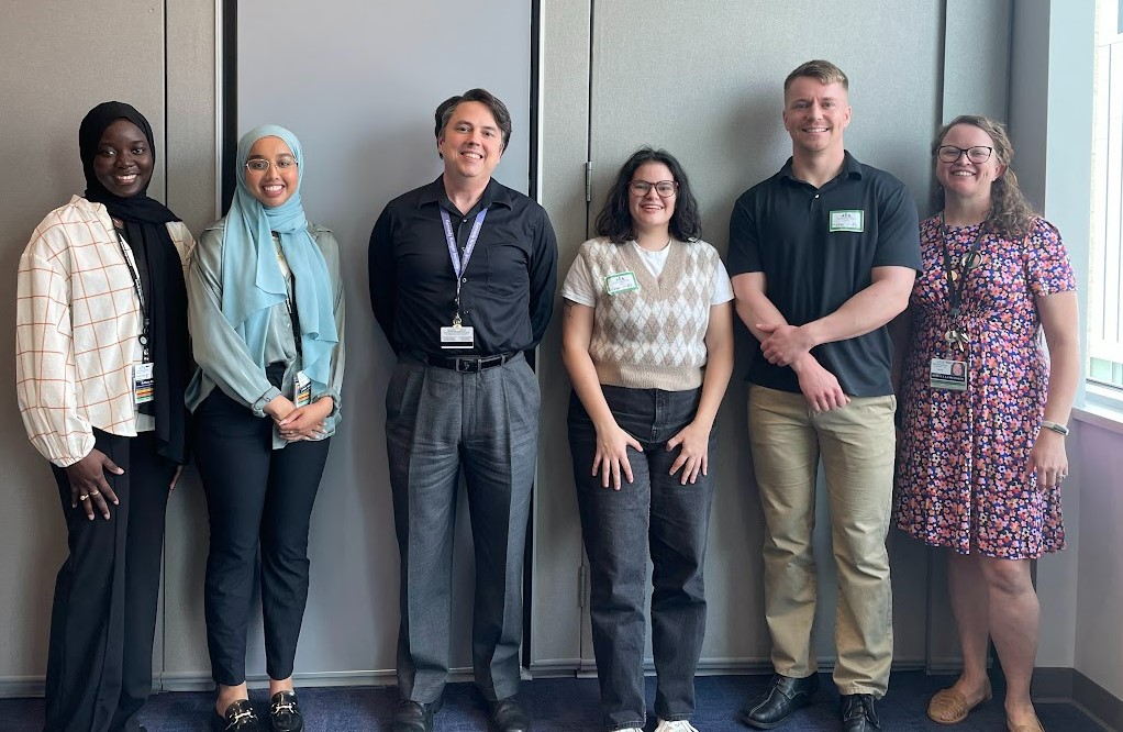 The Neurodiversity at Work spring 2023 cohorts stand for a group photo.2023.