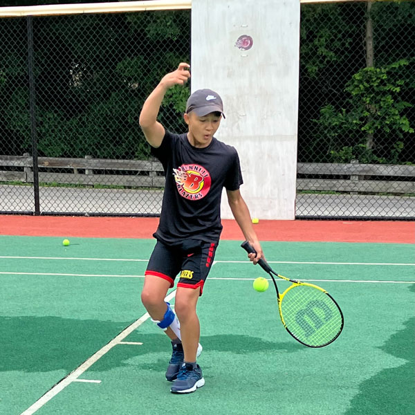 Adaptive Tennis player for Bennett Blazers.