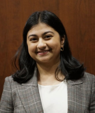 Rianna Mukherjee headshot.