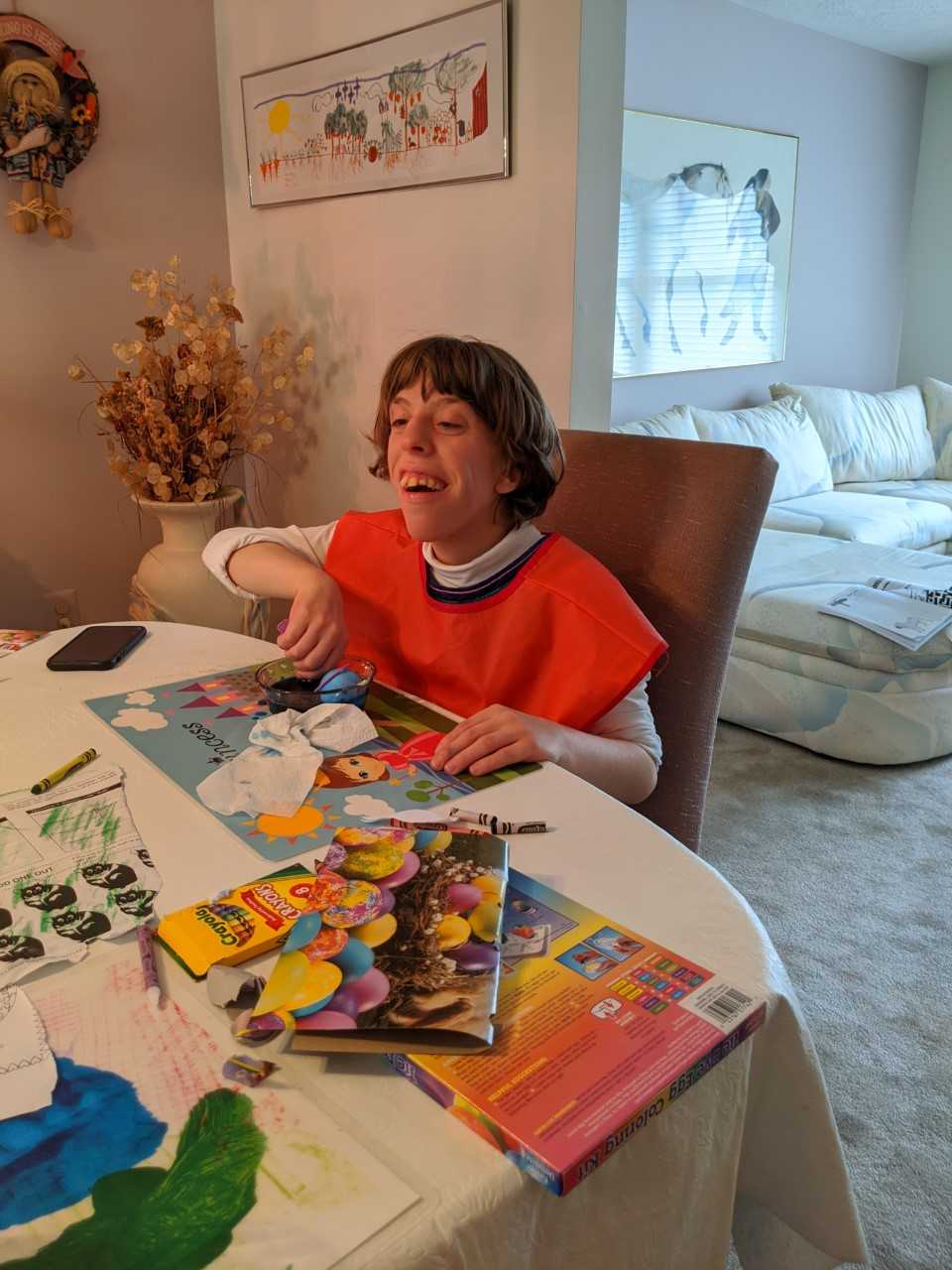 A Post-Secondary Program participant with activity books provided by the Arc of Maryland grant