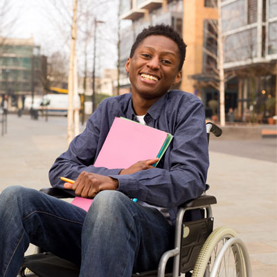 Happy young man holding folders. 