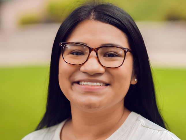 Cindy Ibarra headshot. The image was taken outside.