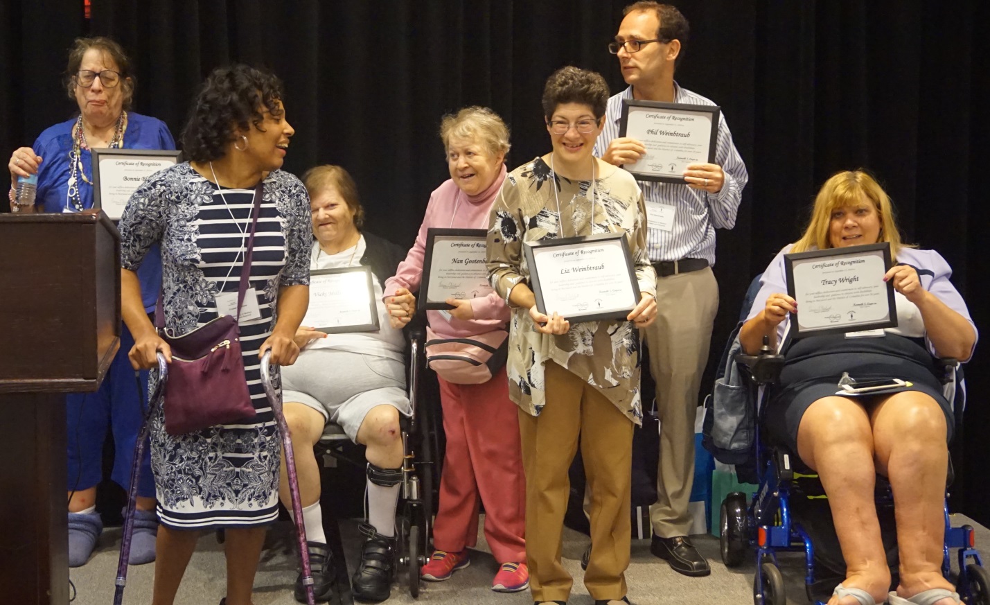 POG self-advocates receive awards at the conference.