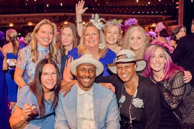 Chris Mason-Hale, Maureen van Stone and seven other women in a group photo from Hats and Horses.