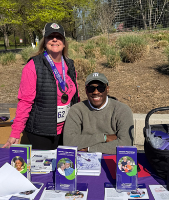 Maureen van Stone and Chris Mason-Hale at MCDD"s exhibitor table at ROAR for Kids