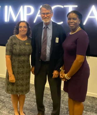 Dr. Mirian Ofonedu and two other attendees at the Disability Impact Awards Ceremony.