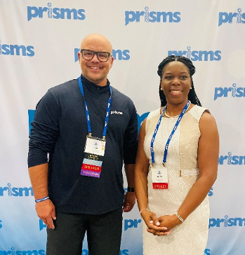 Dr. Ofonedu and another attendee oat the PRISMS conference.