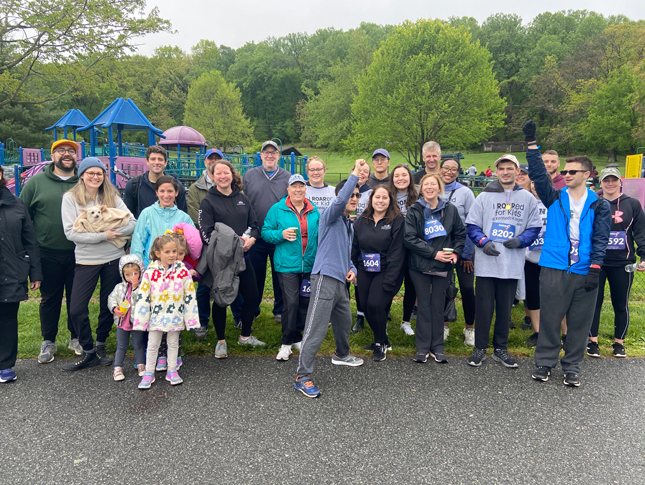 The Neurodiversity at Work team poses for a photo at ROAR 2023.