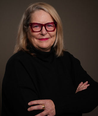 Mary Coster headshot.