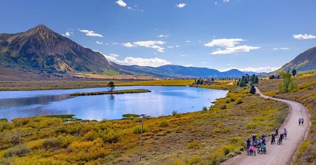 An adaptive sports event takes place against the backdrop of mountains in Crested Butte, Colorado.