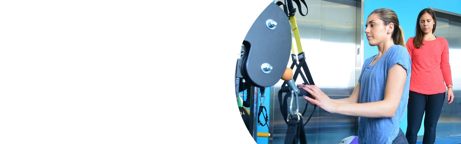 A patient using a machine to help with spinal cord injury.