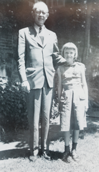 Dr. Winthrop Phelps with a young child. 