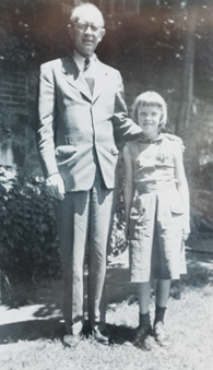 Dr. Winthrop Phelps with a young child.