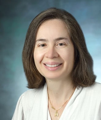 Dr. Andrea Faria headshot.