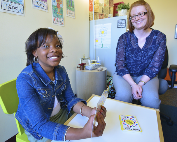 Student and teacher at Kennedy Krieger