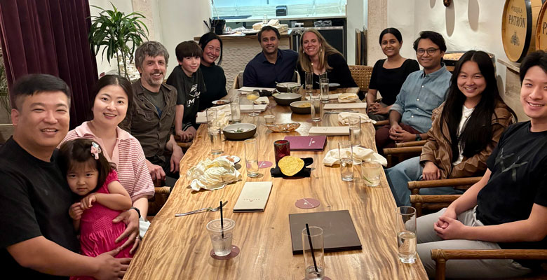 The Brain Dynamics Lab team at a dinner to celebrate Dr. Mark Kramer’s 1st place win in the AI competition at the 2026 AI-EEG Conference. 