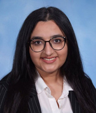 Kripi Singapuri headshot.