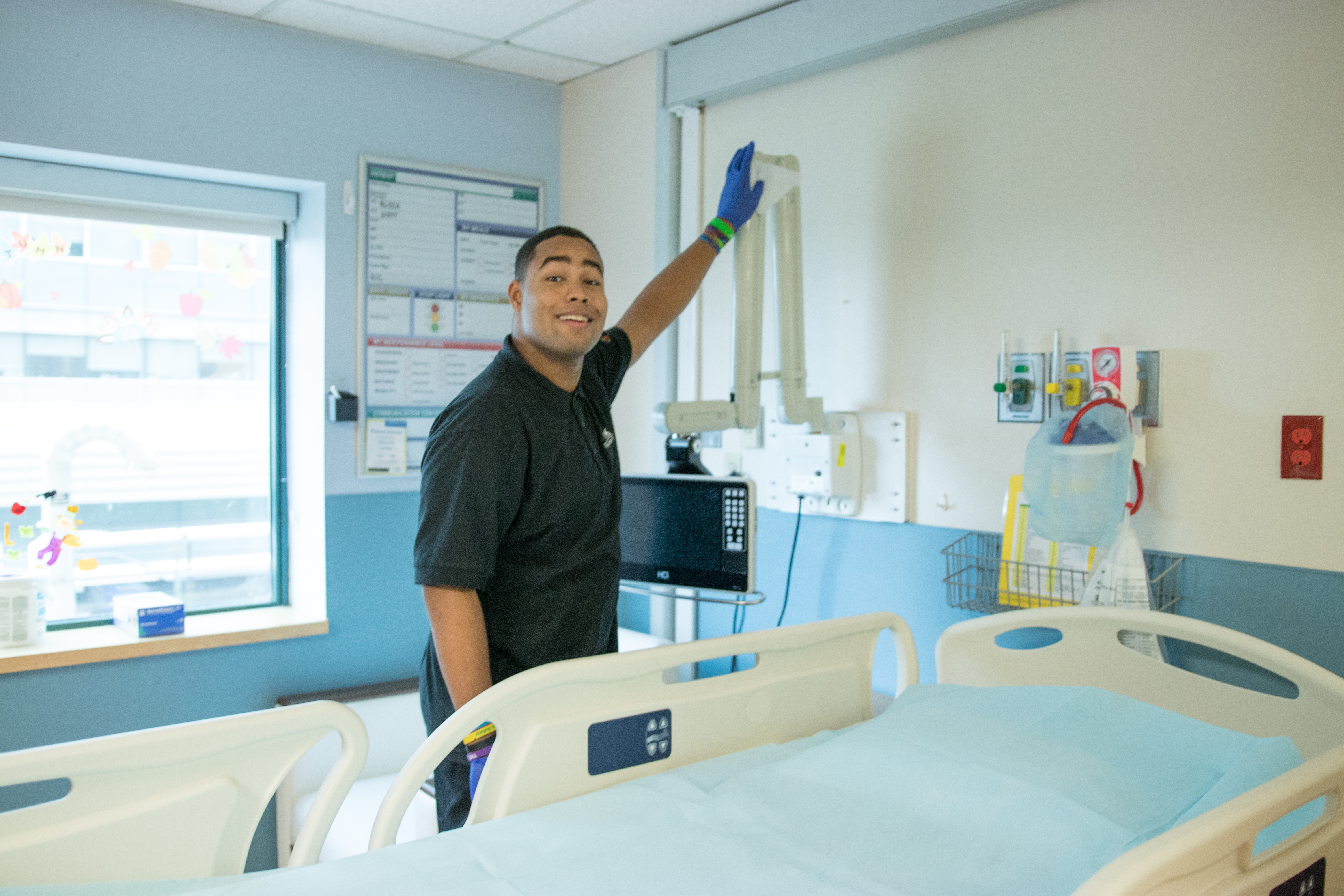 A doctor working with equipment.