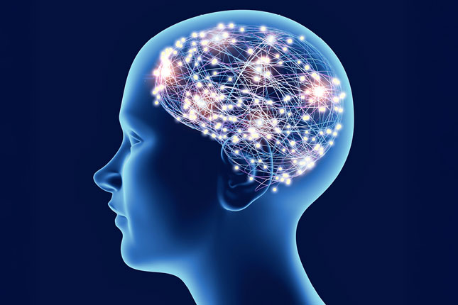 Stock image of a brain scan, with neurons in bright colors.