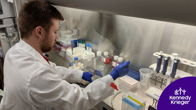 A researcher working in a lab.