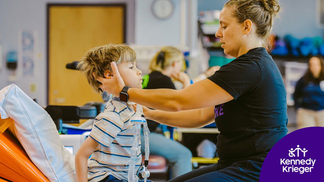 A child receives inpatient therapy at Kennedy Krieger.