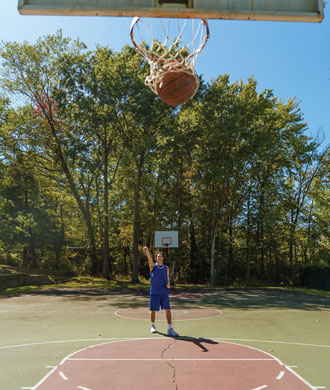 Hayden makes a free throw on a basketball court.