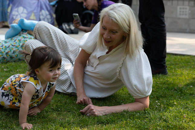 WIN co-president Cynthia Cavanaugh with a patient in Kennedy Krieger's therapy garden.
