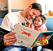 Sanayah shares a tender moment with her dad during her inpatient stay