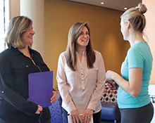 Lisa Trotta and Angela Huff talk with Melissa, Julia's mom.