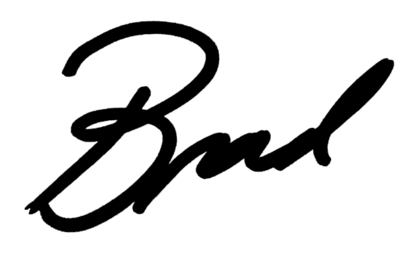 The signature of Brad Schlaggar, President and CEO of Kennedy Krieger