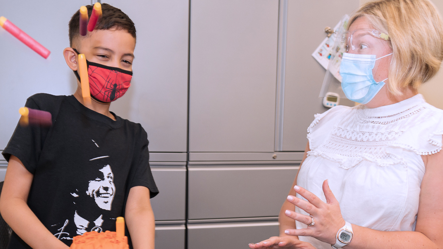 Creed, left, and speech-language pathologist Christine Feinour.