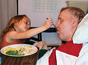 A young Taylor with her dad, John Kane