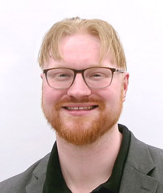 Dr. Daniel Bennett headshot.