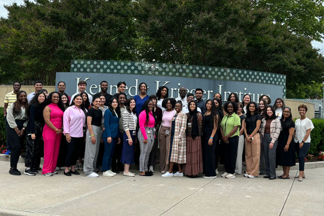 Ferguson Rise scholars in a group photo outside of Kennedy Krieger Institute.