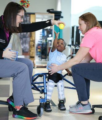 A patient receives treatment at the International Center for Spinal Cord Injury