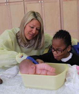 Shari Tompkins and a Kennedy Krieger patient. 