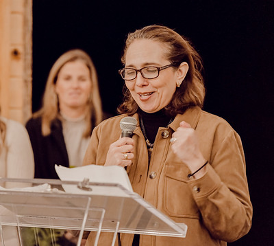 Dr. Carmen Lopez speaks at Barrels & Bonfires.