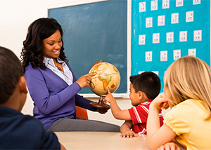teacher with globe