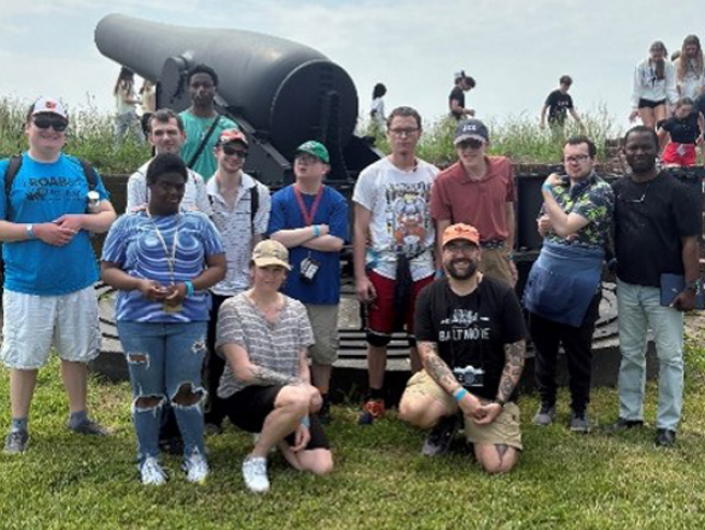 Group photo from a Neurodiversity at Work outing at Fort McHenry in Baltimore.