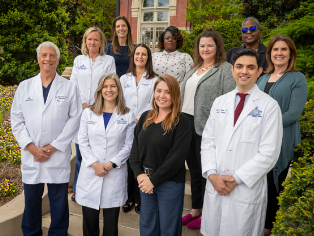 The Pediatric Neurofibromatosis Program team standing outside of Johns Hopkins Hospital